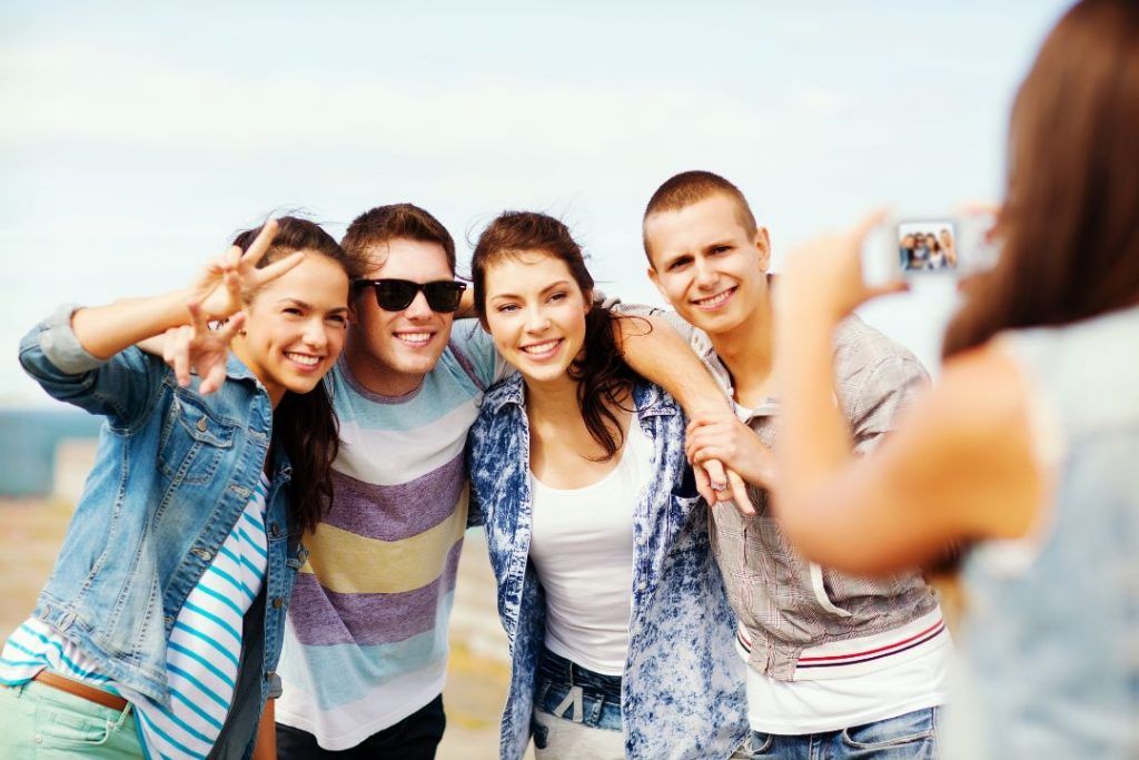 assign someone to take photos